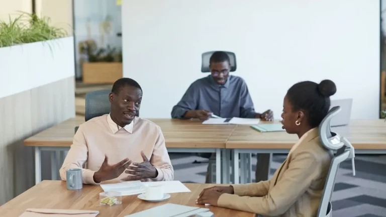 Kenyan employee meeting with HR to discuss terminal dues at the end of employment